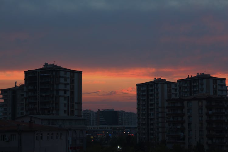 Silhouette Of City Buildings During Sunset