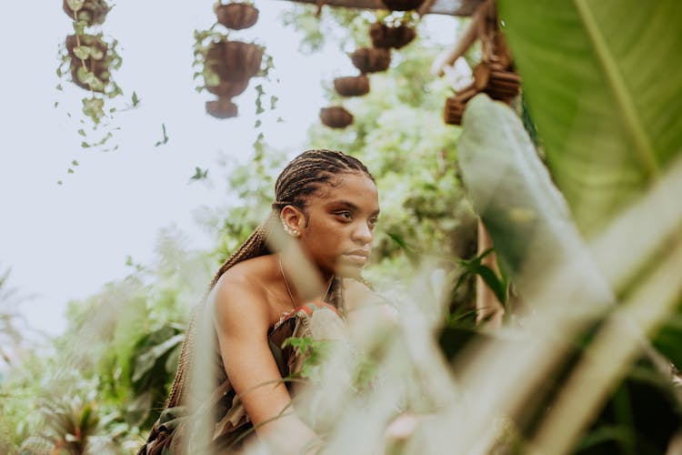 Gorgeous Young African Woman Resting In Jungle