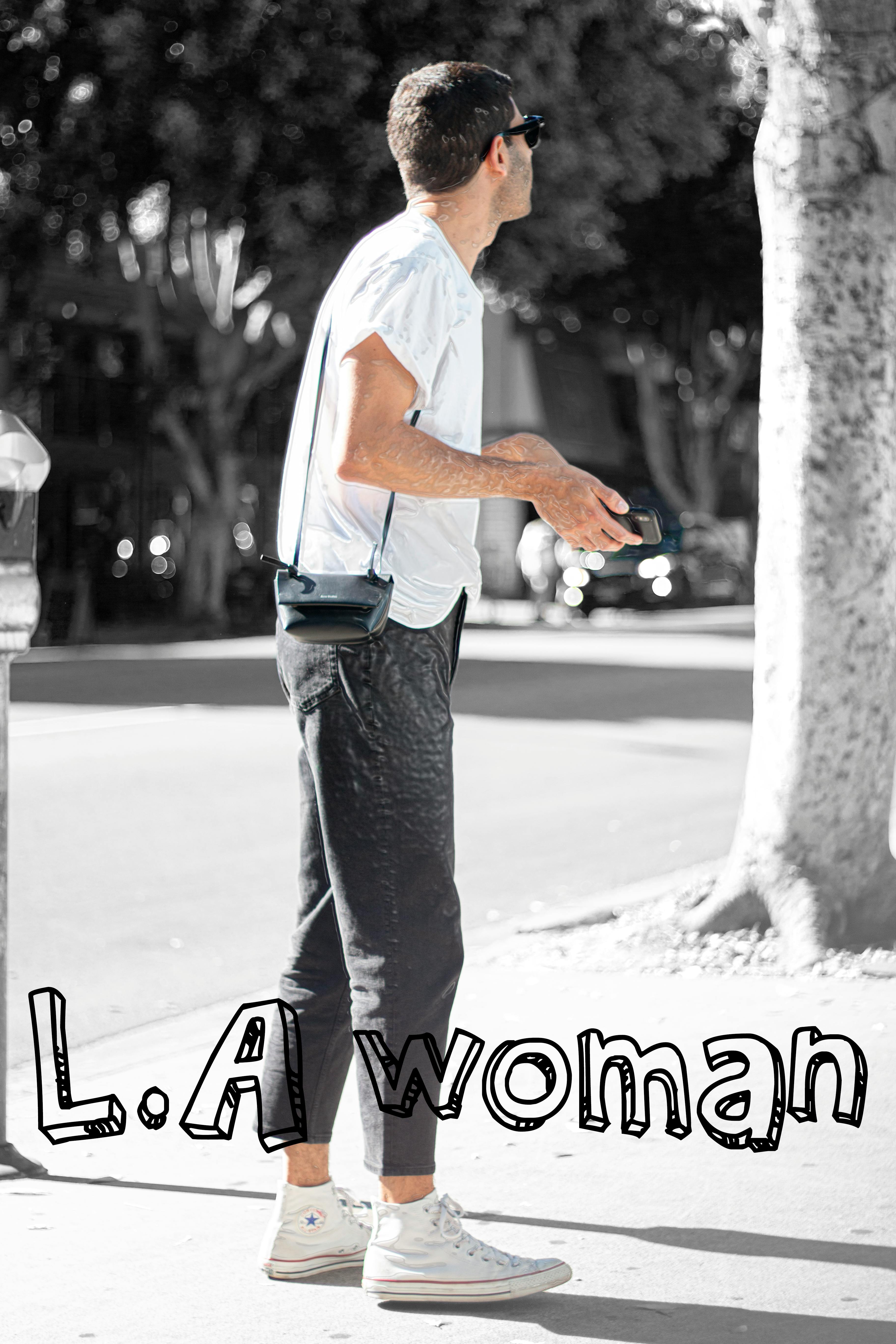 Meal prep containers filled with grains, vegetables, and proteins