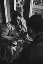 Man and Woman Holding Wine Glasses