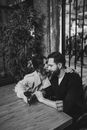Man and Woman Sitting on Bench