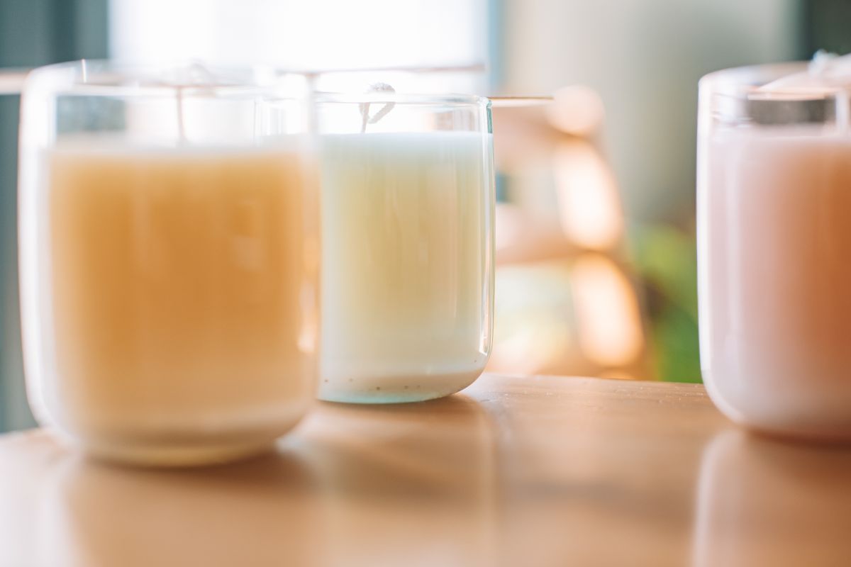 Pastel soy candles in glass jars