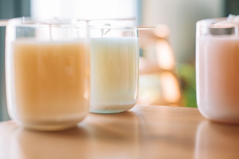 Pastel soy candles in glass jars