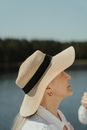 Woman in White and Black Knit Cap