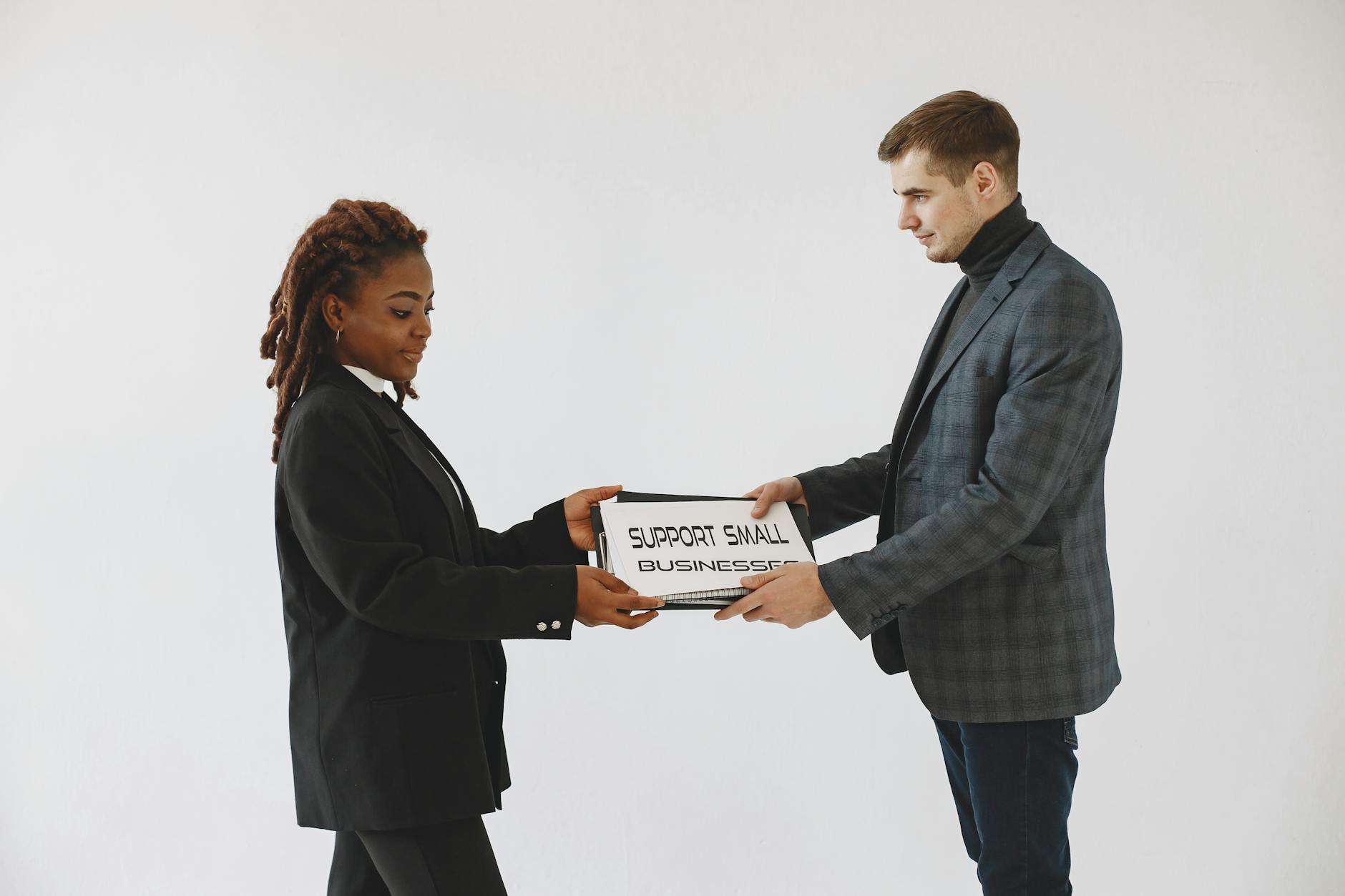 https://www.pexels.com/photo/man-and-woman-wearing-a-corporate-attire-5934180/