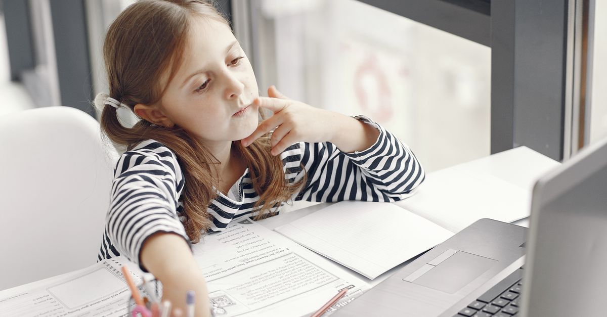 Little Girl Studying Online on Computer · Free Stock Photo