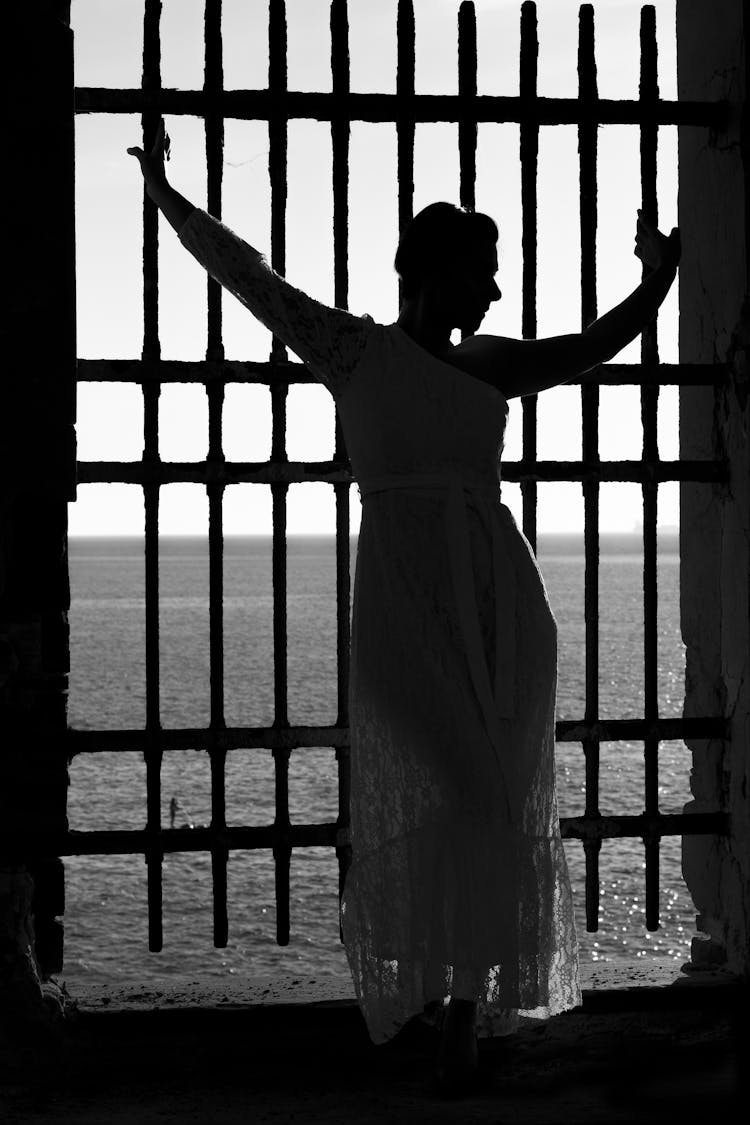 Silhouette Of A Woman Standing