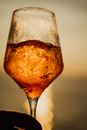 Clear Wine Glass With Brown Liquid