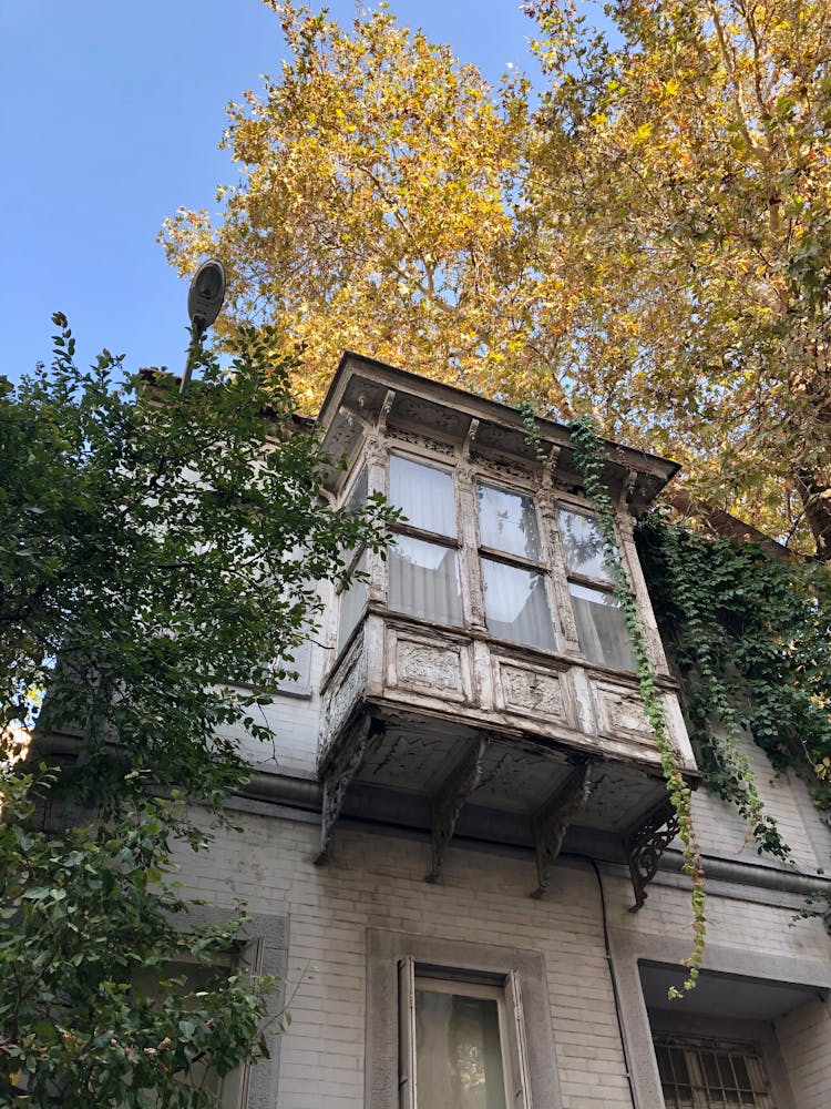 Enclosed Wooden Balcony On Old Building