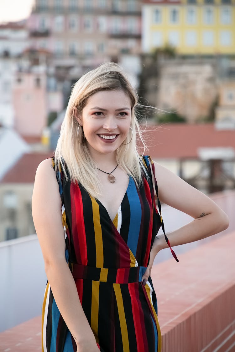 Beautiful Woman Wearing A Colorful Striped Dress