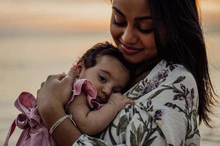 Beautiful Mother With Her Baby