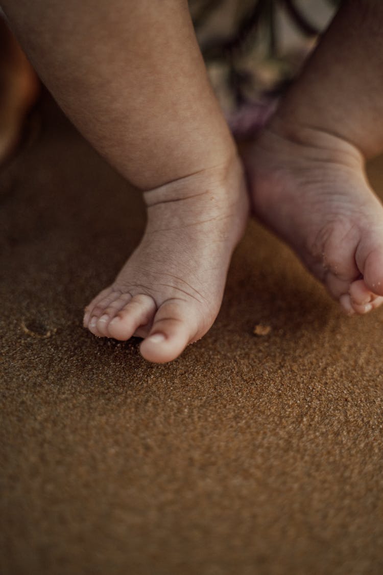 Close-up Photo Of A Baby's Small Feet