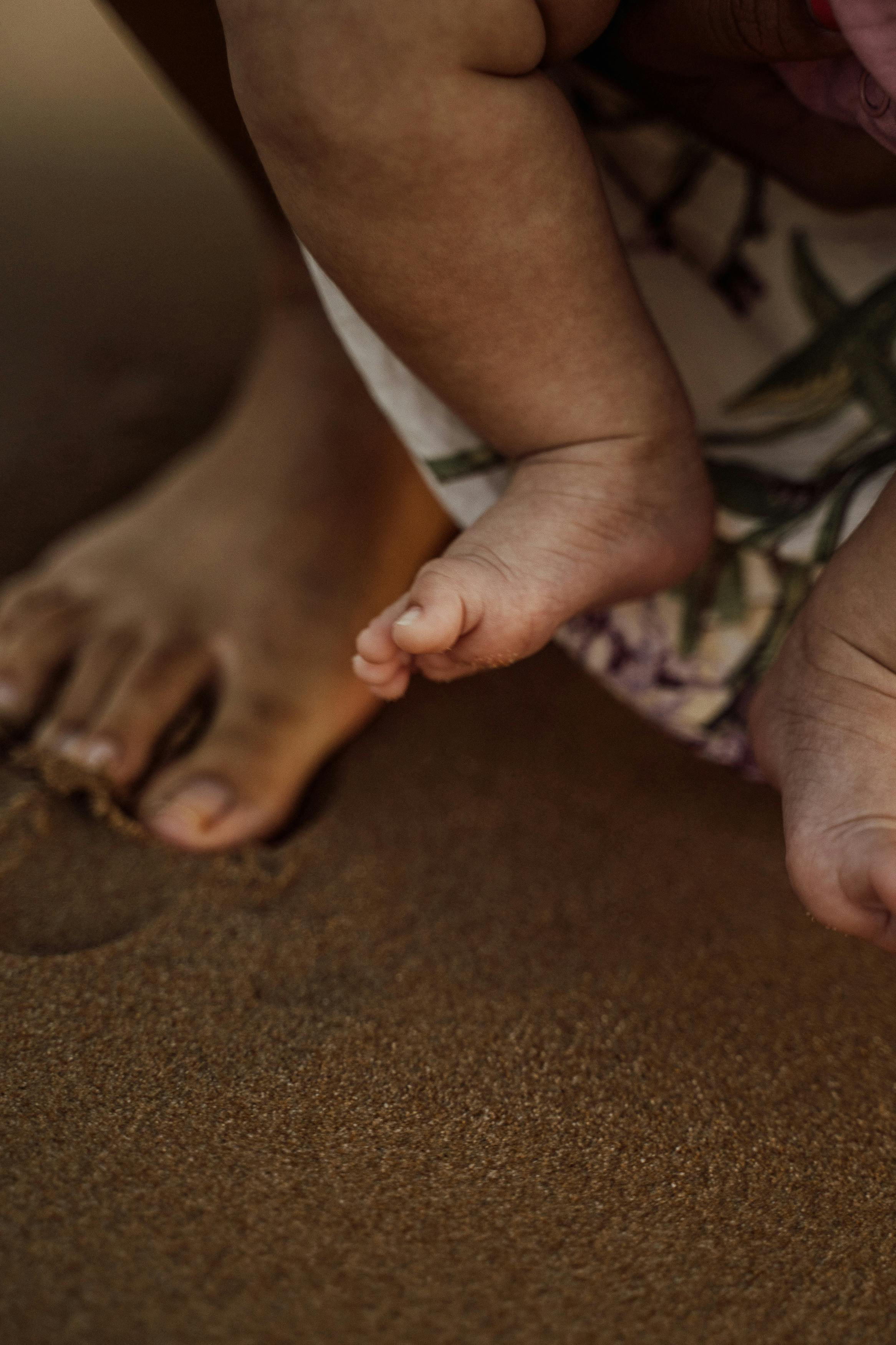 sand on baby s feet