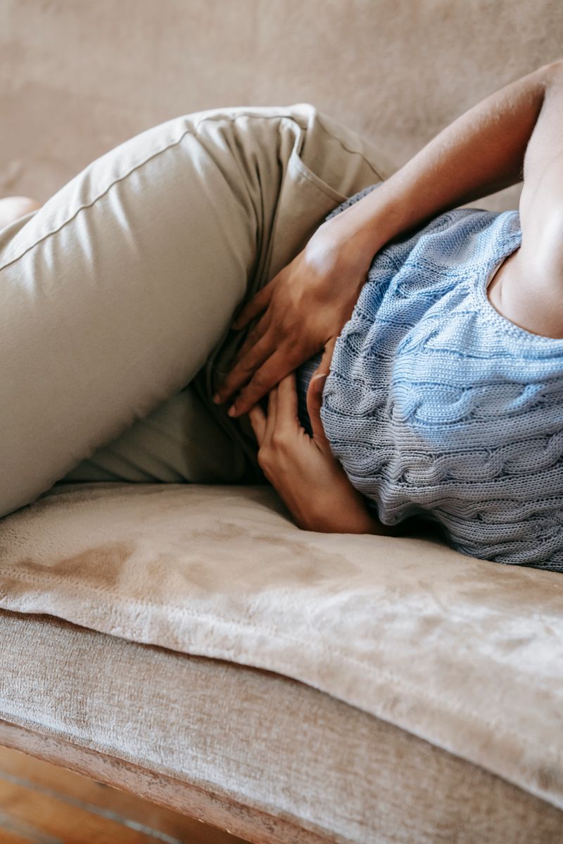 Woman suffering from bloating and digestive pain