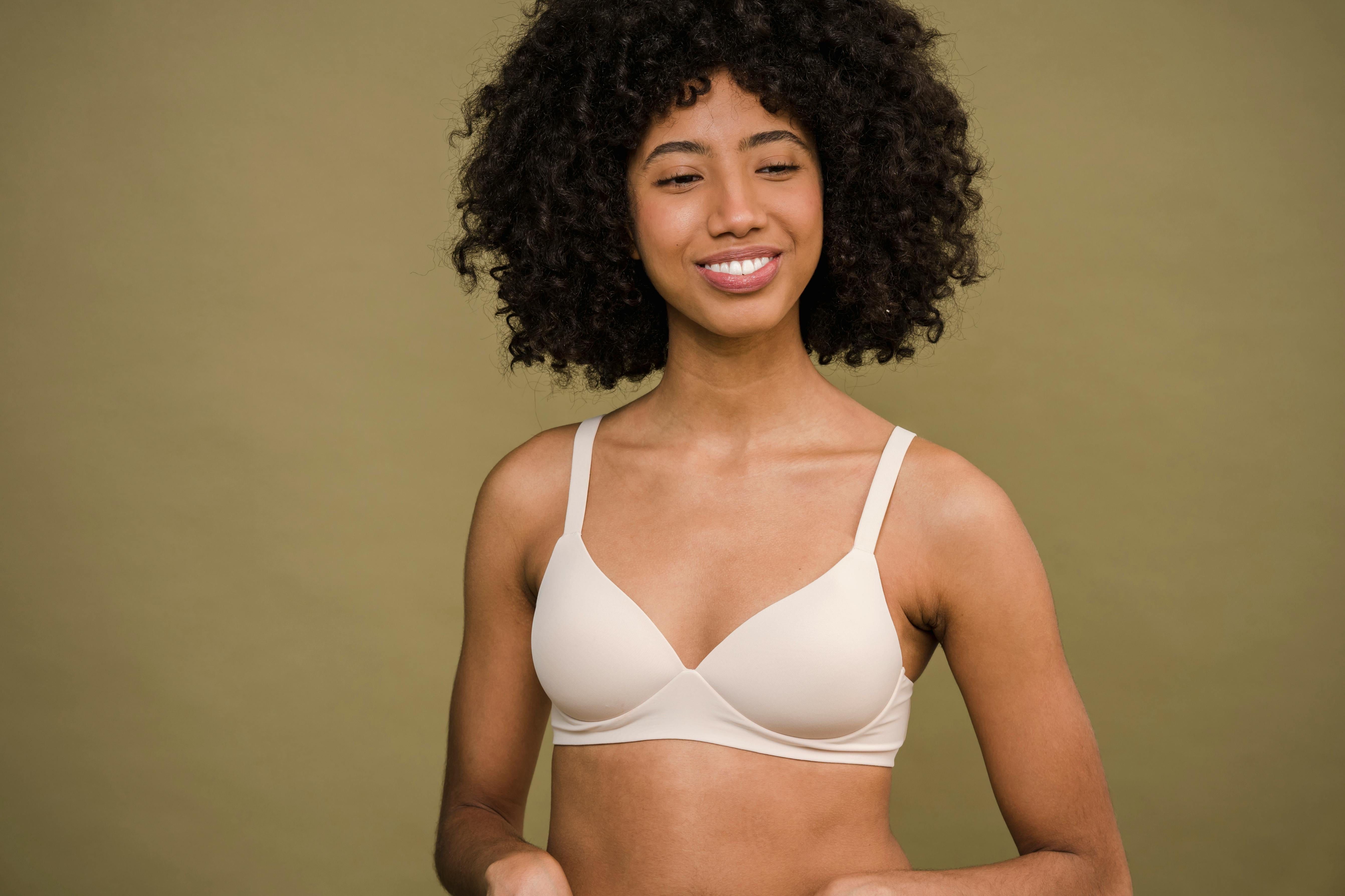 Cheerful young ethnic woman in underwear · Free Stock Photo