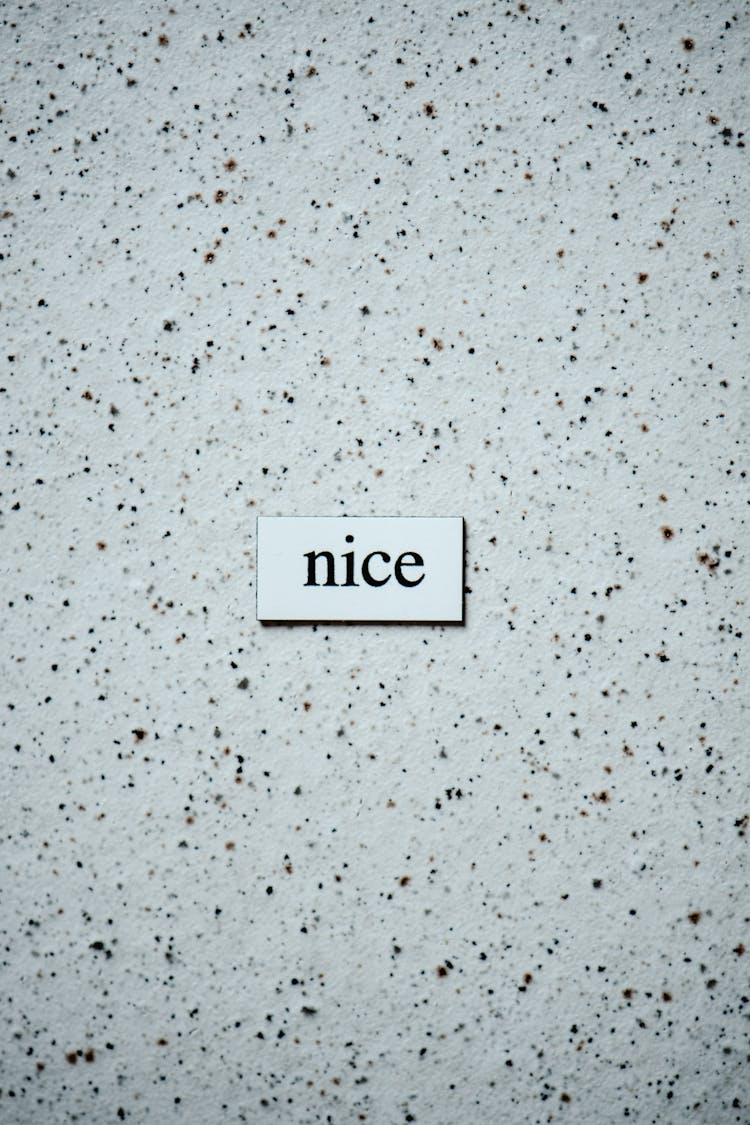 Word Nice Against Dotted Background