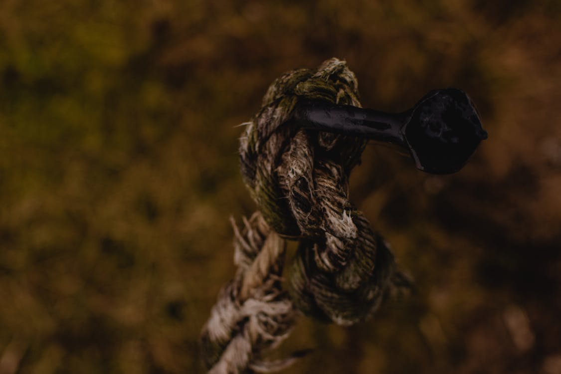 Knot on Metal Nail in Close Up