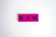 Pink and Black Letter M