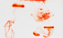Colored smoke diffusing in air