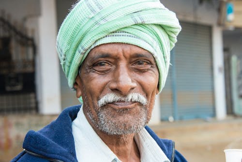 A Man wearing Headscarf