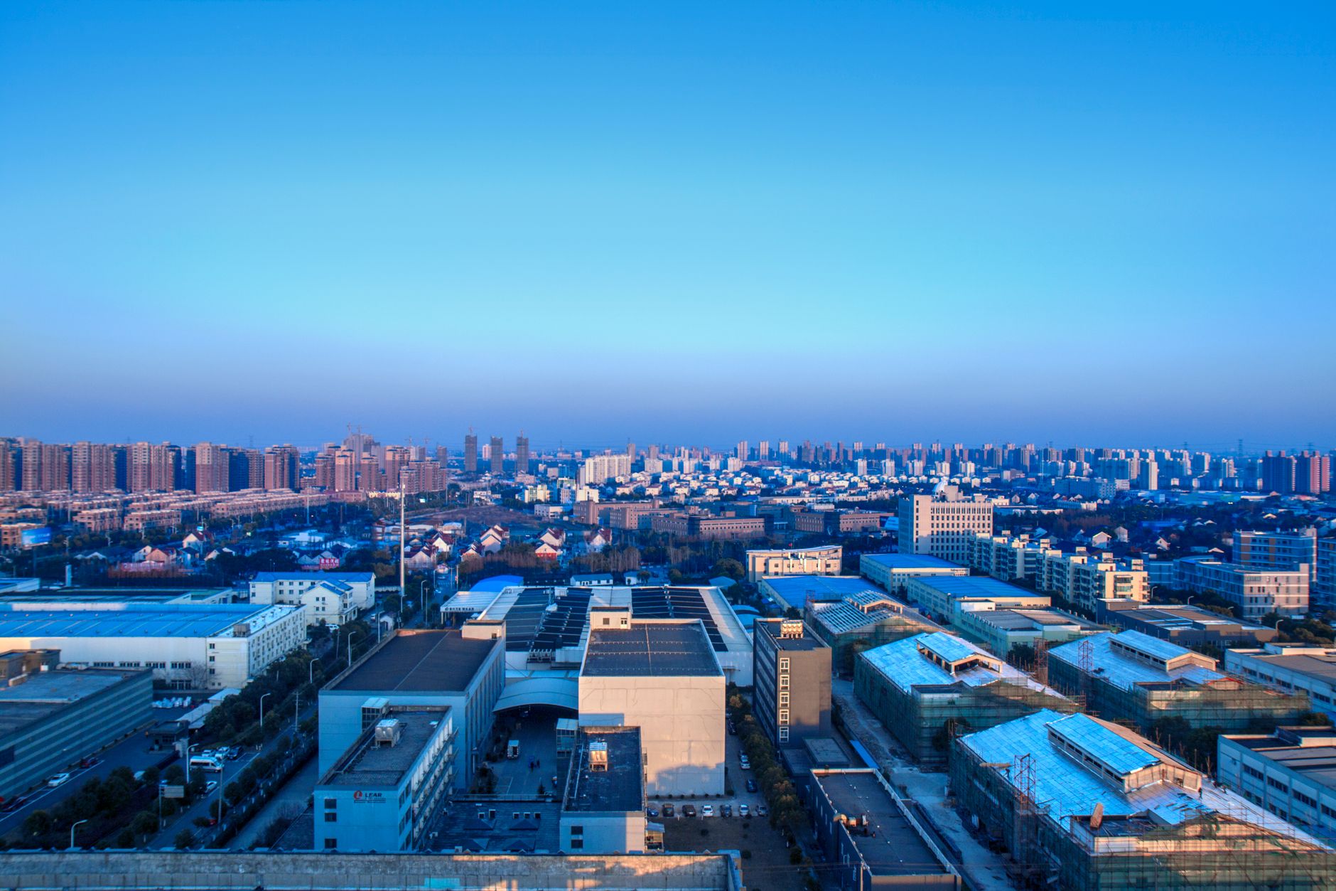 Stunning urban skyline of Shanghai, China at twilight, showcasing city architecture.