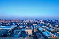 Aerial View of City Buildings under Blue Sky
