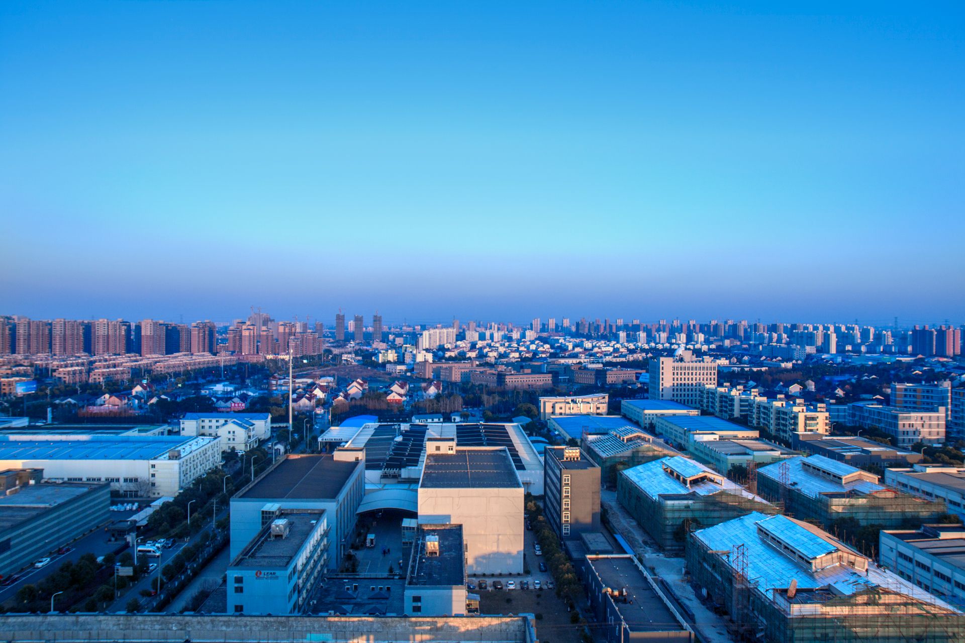 Stunning urban skyline of Shanghai, China at twilight, showcasing city architecture.