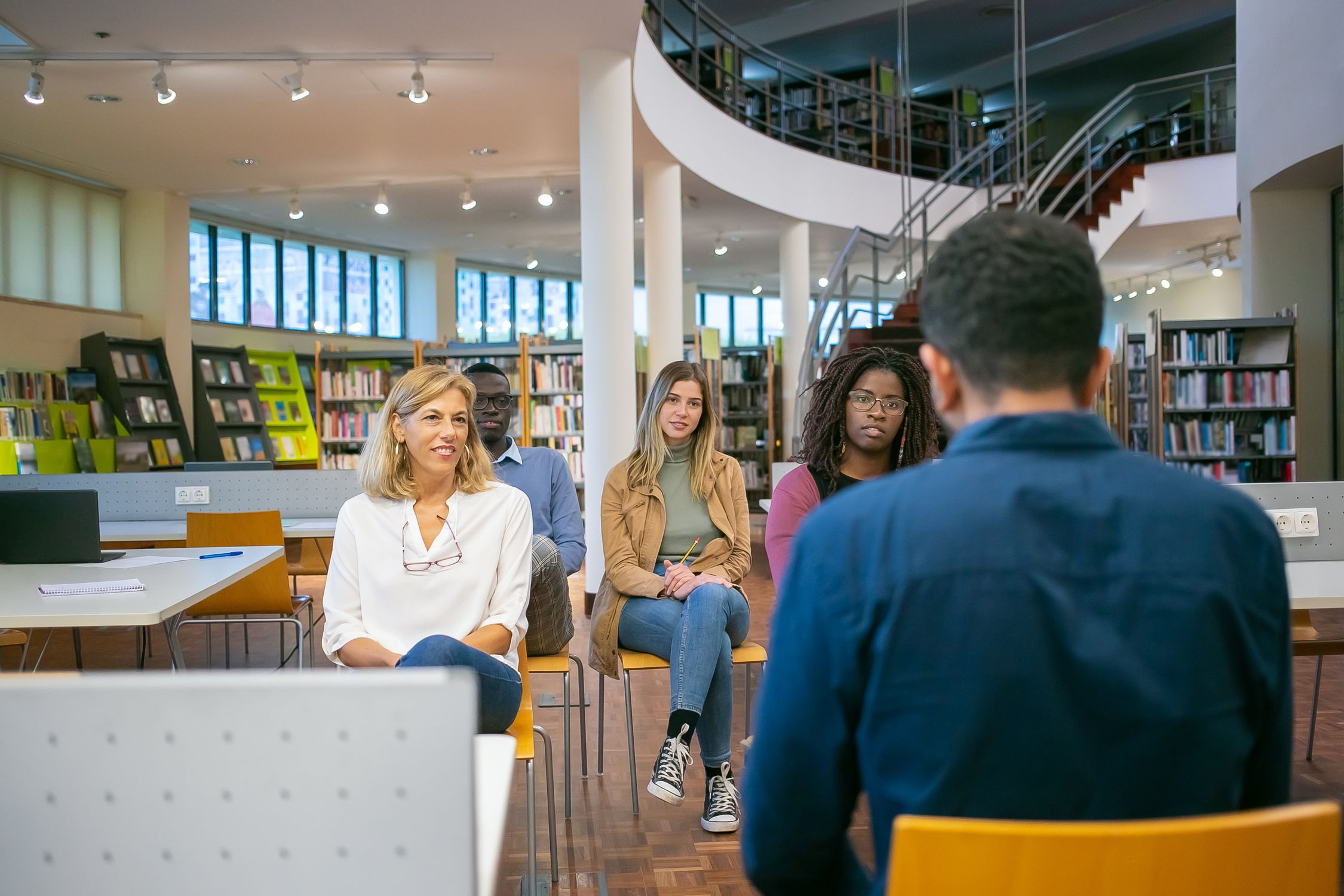 College Students Group Discussion in University