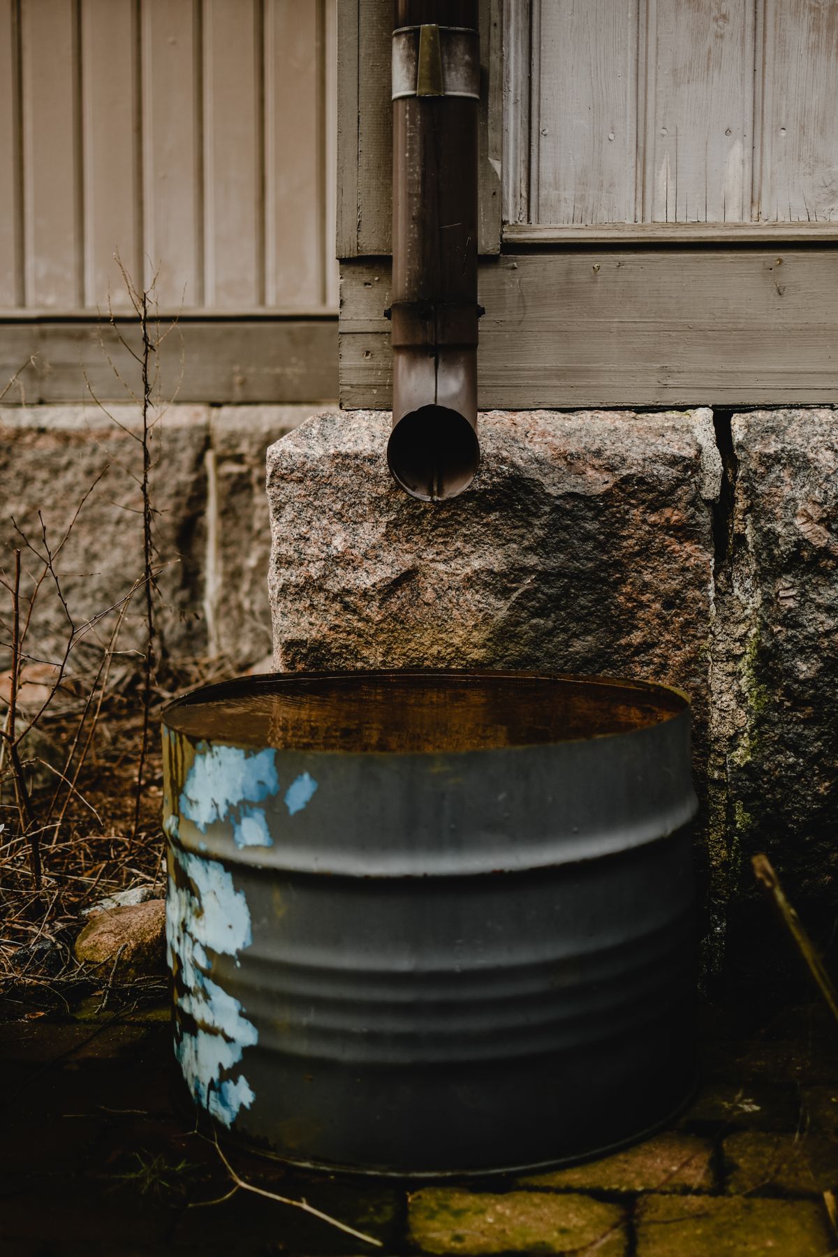 Residential downspout directing water away from a building