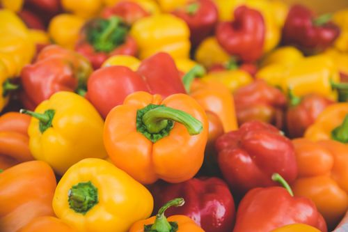 Free Colorful assortment of fresh, ripe bell peppers in close-up, highlighting food freshness. Stock Photo