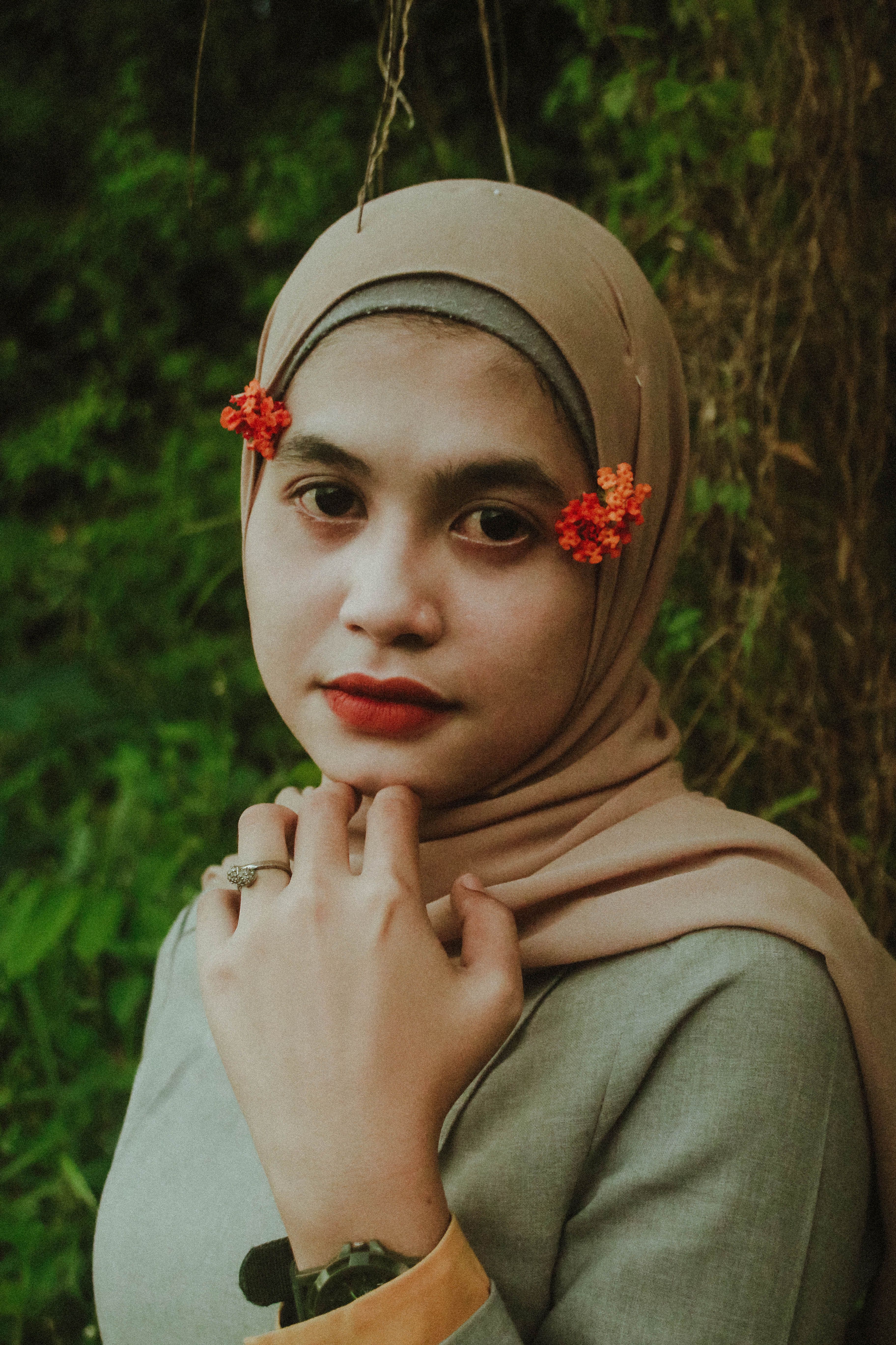 Close-Up Shot of a Woman in Brown Hijab · Free Stock Photo