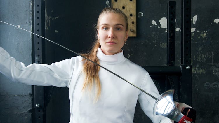 A Woman Holding Fencing Sword
