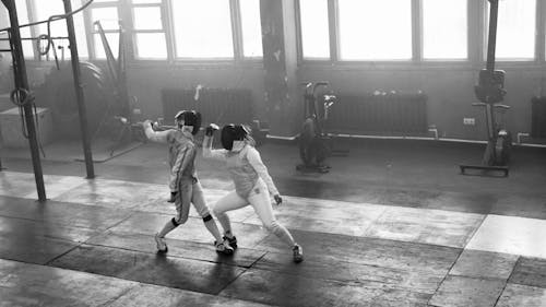 Free Fencers Doing a Match Stock Photo