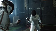 Two People Fencing