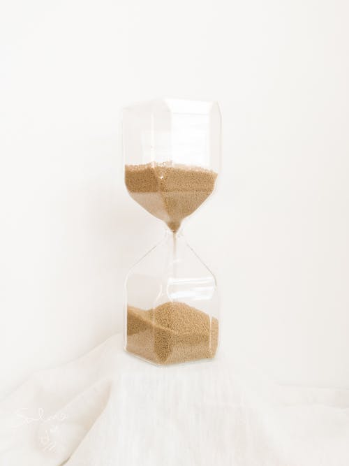 Free Brown Sand Grainer on Hour Glass Stock Photo