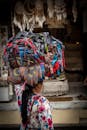 Woman Carrying on Head a Bundle of Textile
