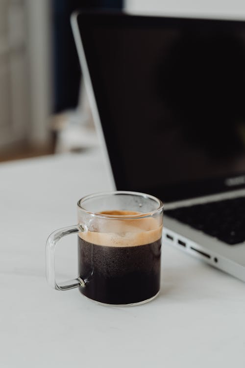 Close Up of Espresso on Side of Laptop