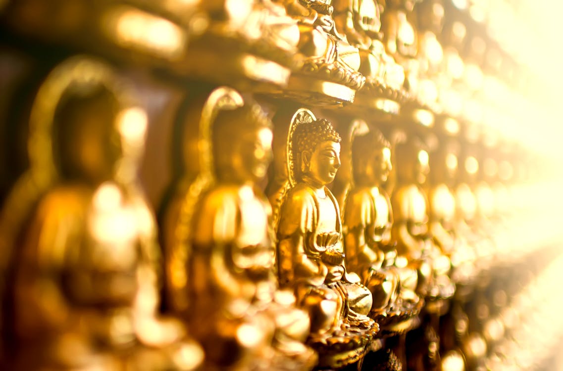 Free Gold Buddha Figurine Lot Stock Photo