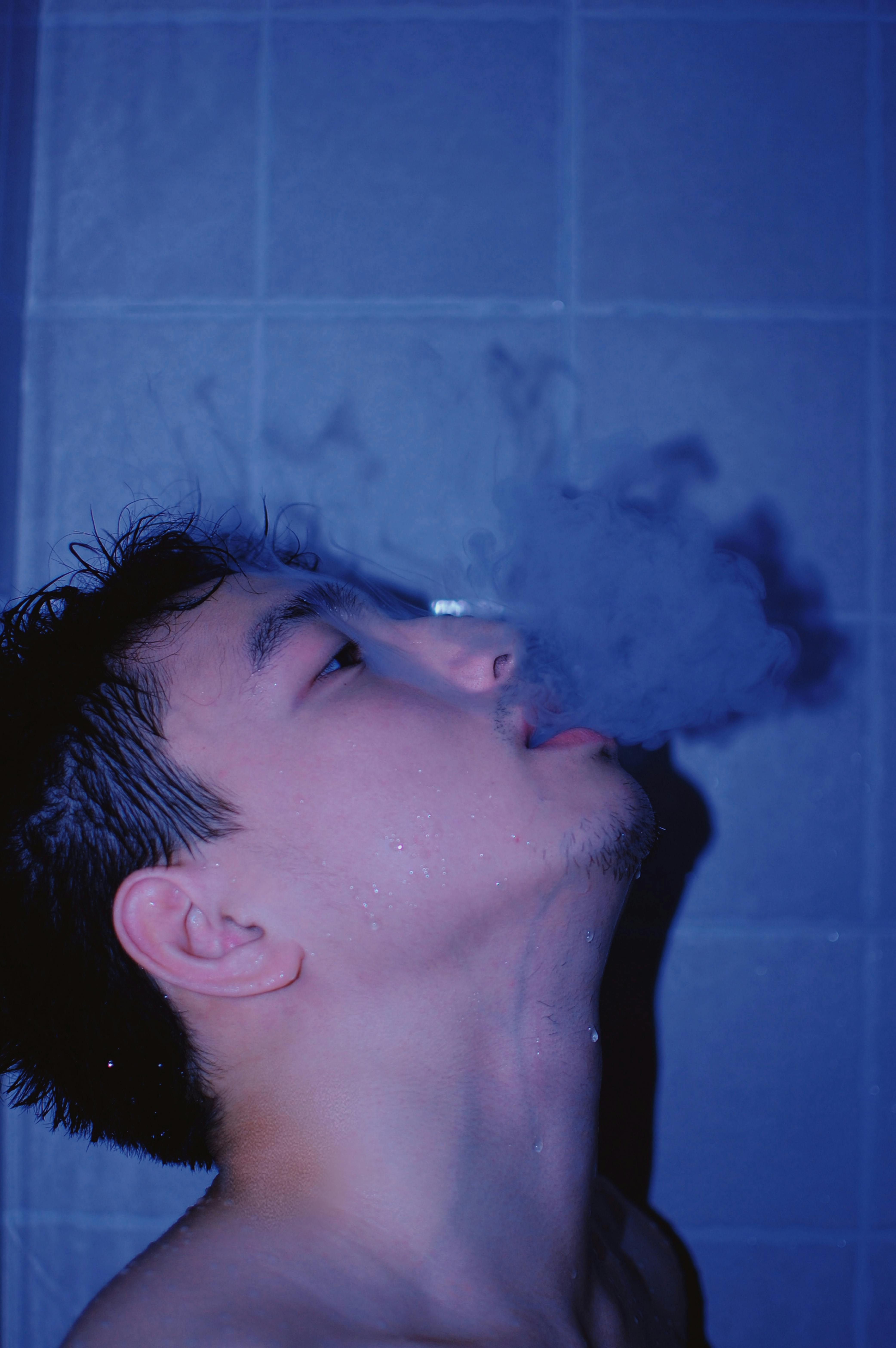 close up shot of a man smoking