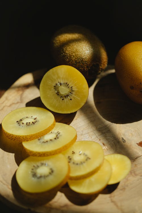 Slices of fresh kiwi on table