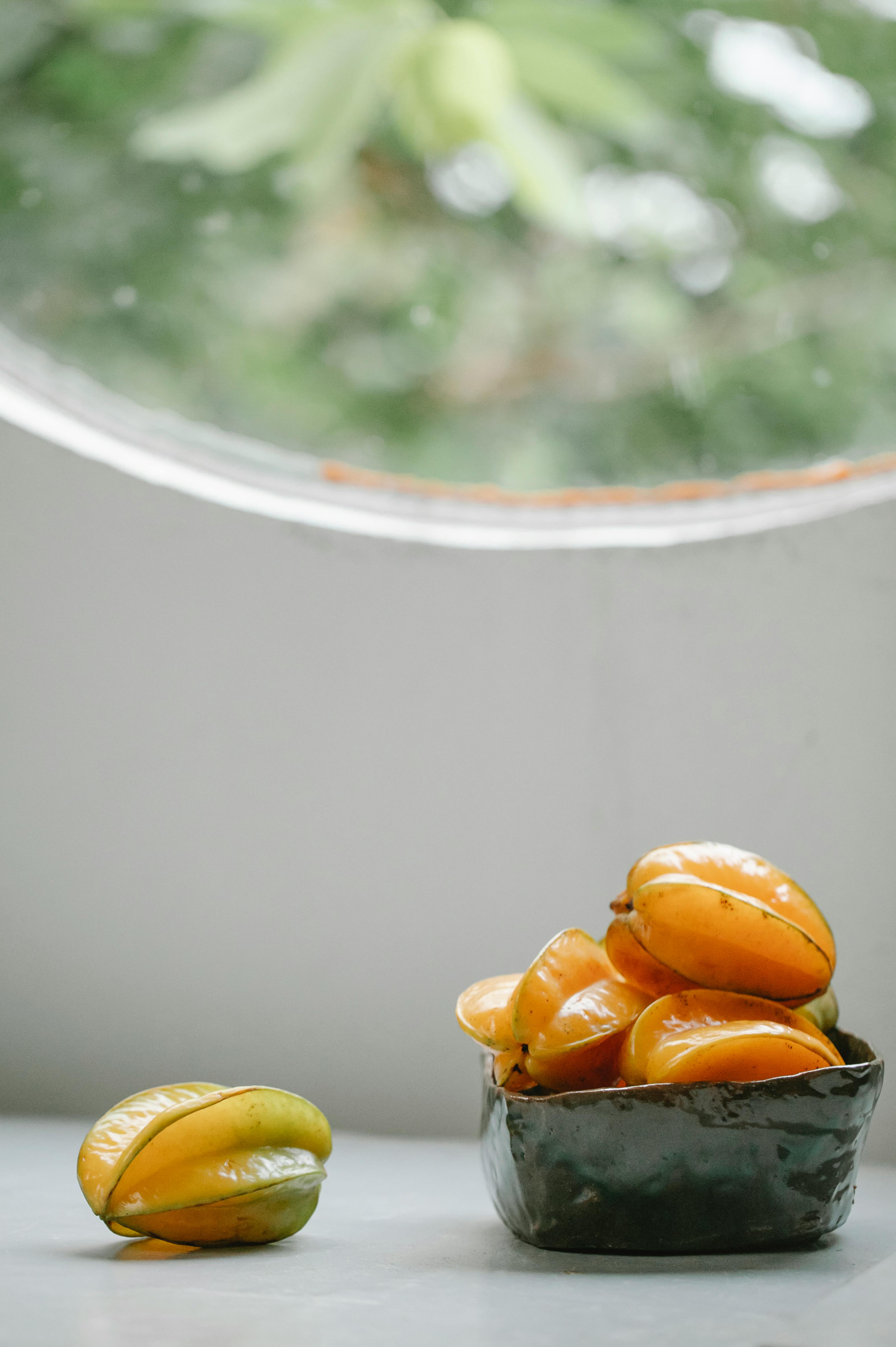 carambola fruit on white table