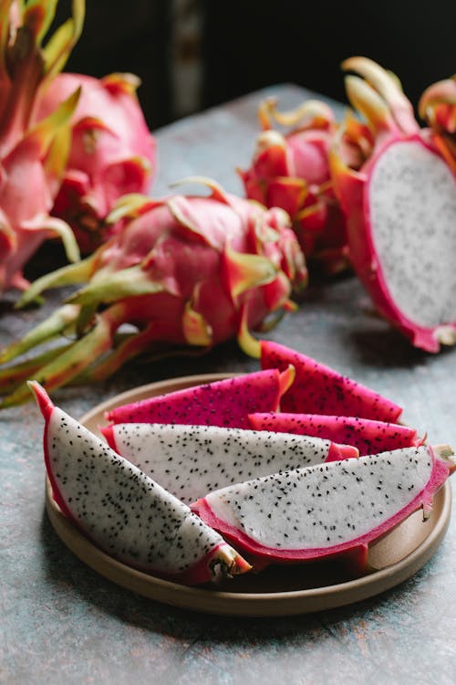 Free Delicious Sliced Dragon Fruit on Plate Stock Photo