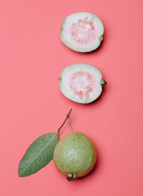 Guava fruits on pink background