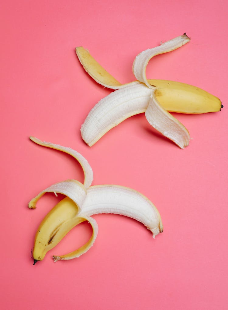 Mellow Sweet Bananas On Pink Surface