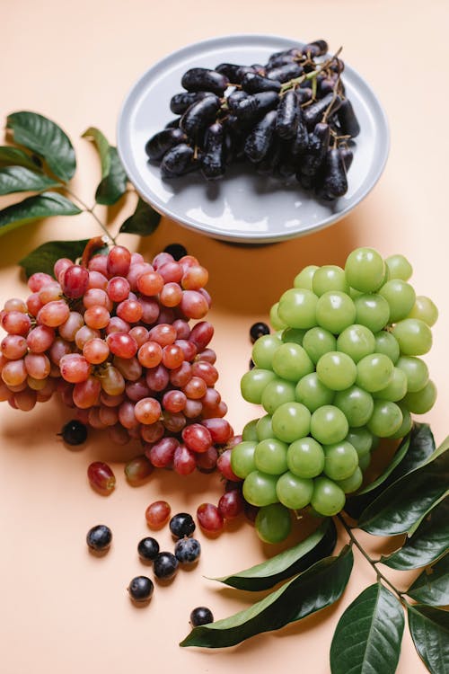 Delicious fresh grapes on table