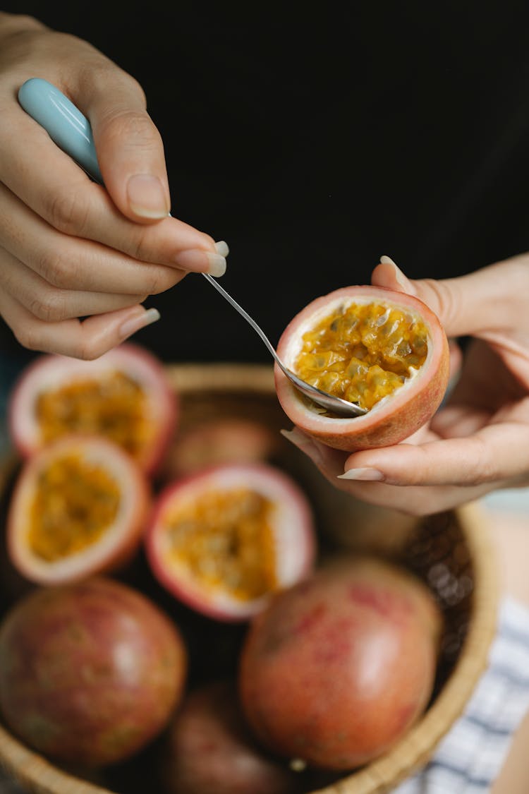 Woman Having Fresh Juicy Passion Fruit