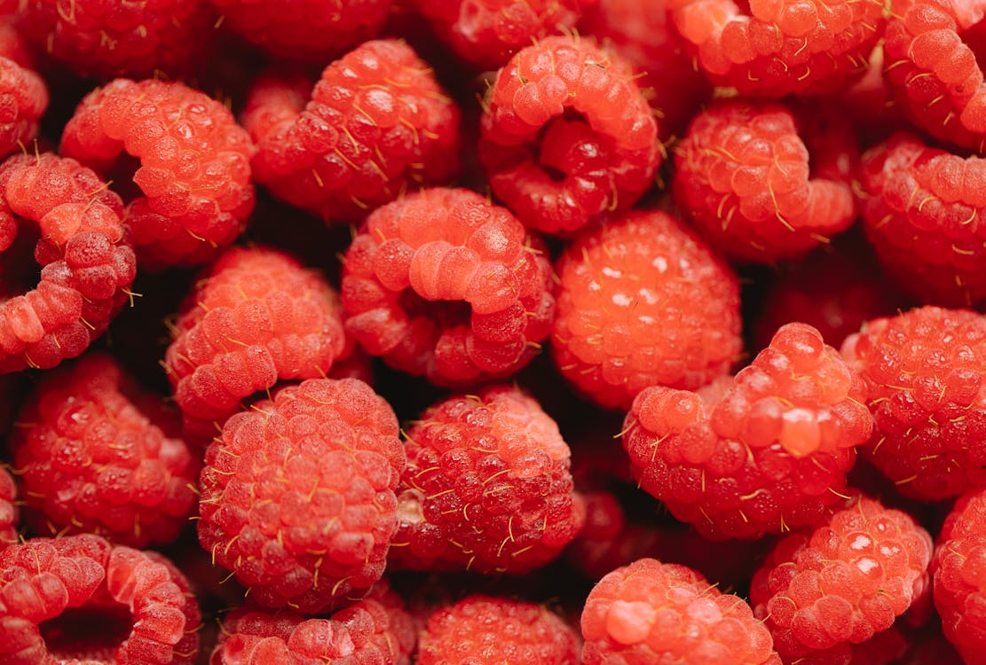 Bunch of ripe red delicious raspberry