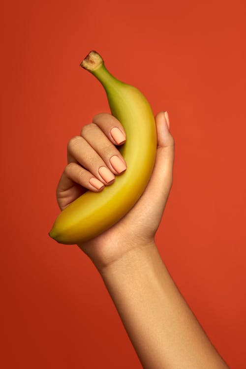 Základová fotografie zdarma na téma banán, detail, držení
