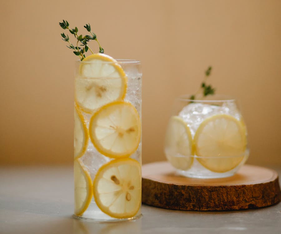 Free Glasses with lemon drink on table Stock Photo