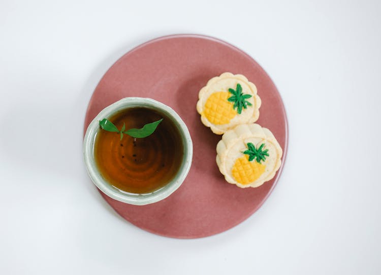 Cup Of Black Tea With Sweet Treats